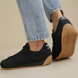 the khaite x adidas originals sneaker in black